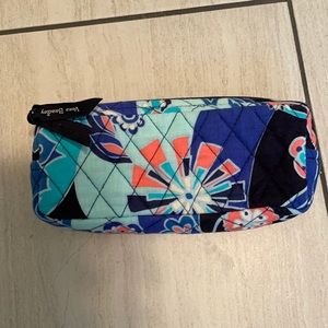 Vera Bradley small lined makeup bag.